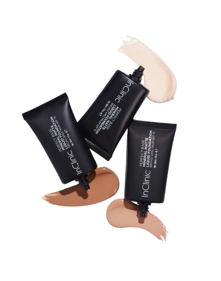 A product shot featuring three black squeeze tubes of InClinic Perfect Base Mineral Matte Liquid Foundation, each lying near a swatch of the product in a different shade.