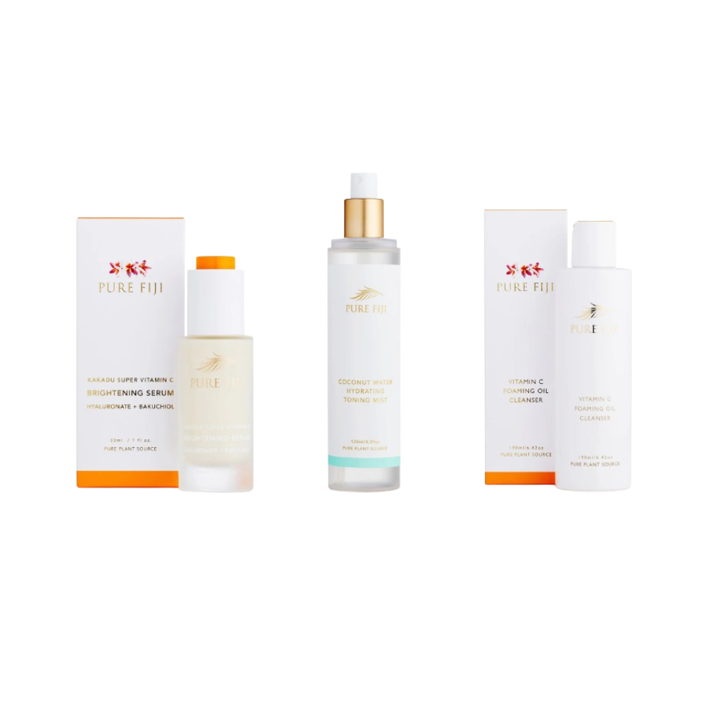 A product image showcasing three sets of Pure Fiji skincare products arranged side-by-side on a dark background.