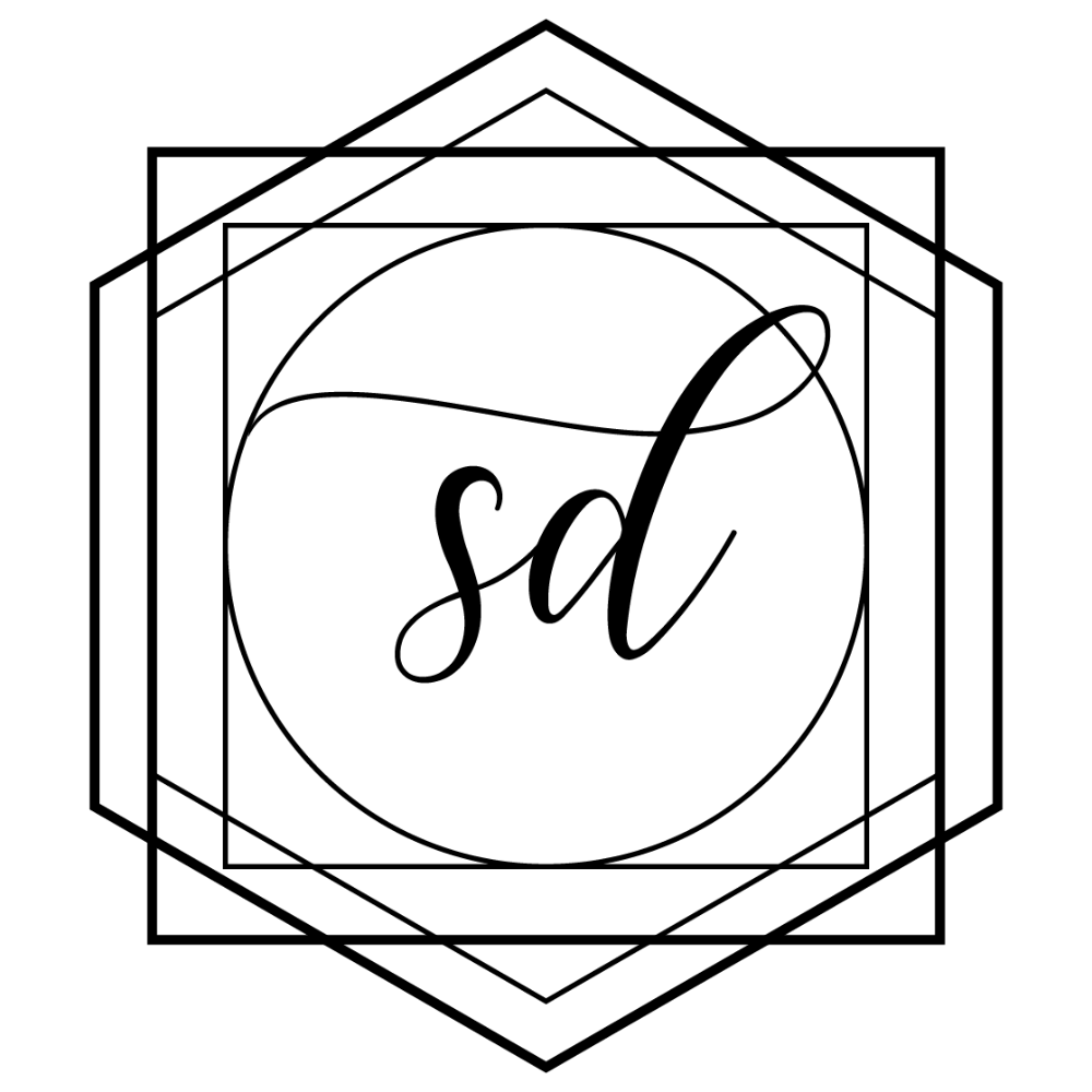 A black monogram of Skin Deep